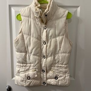 Cream-colored puffer vest